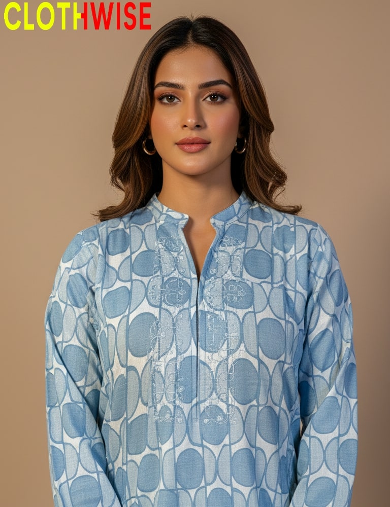 Woman wearing a blue patterned shirt with 'CLOTHWISE' branding on a beige background