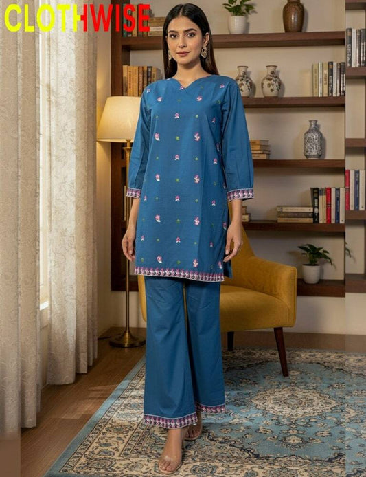 Woman wearing a blue traditional outfit with a 'Clothwise' logo in the corner.