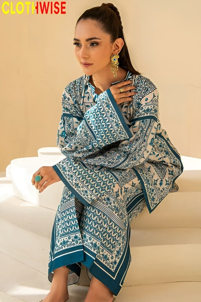 Woman wearing a patterned dress with 'ClothWise' branding.