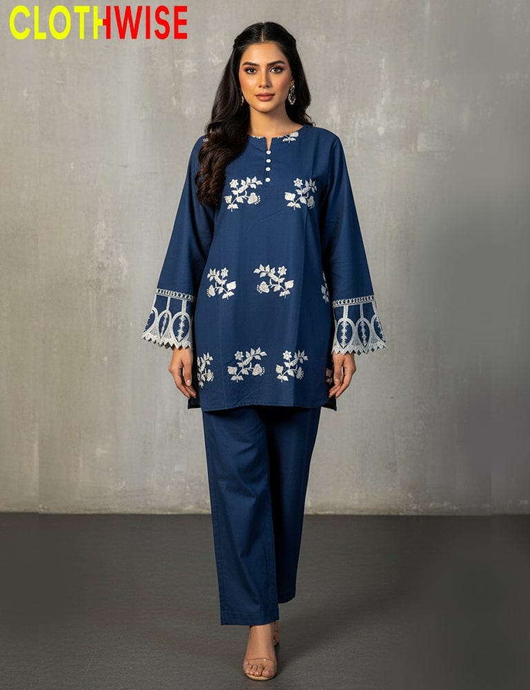 Woman wearing a blue embroidered outfit with 'Clothwise' branding.