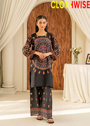 Woman wearing a black and patterned outfit with 'Clothwise' branding.