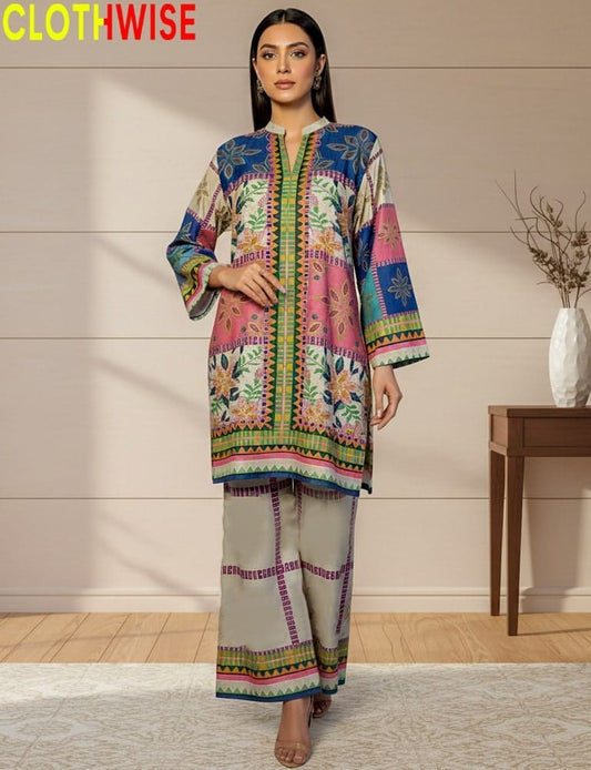 Woman wearing a colorful traditional outfit with 'CLOTHWISE' branding.