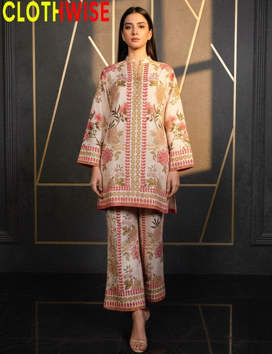 Woman wearing a floral outfit with 'CLOTHWISE' branding in the corner.