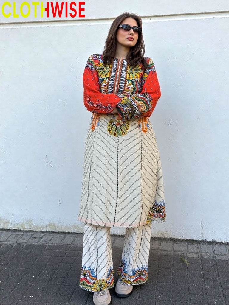 Woman wearing a colorful outfit with 'CLOTHWISE' branding against a white wall.
