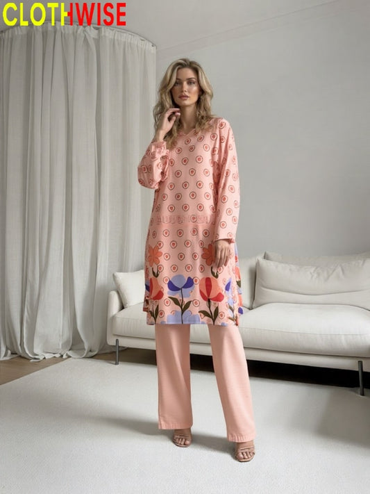 Woman wearing a floral dress and pants in a minimalistic room with 'CLOTHWISE' branding.