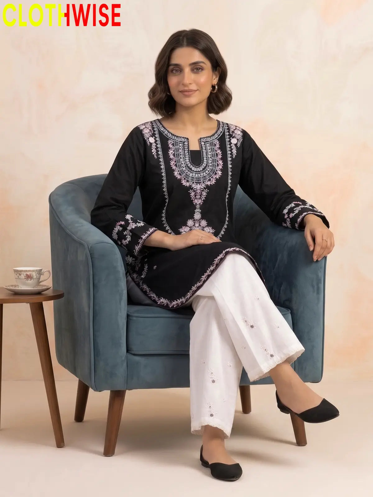 Zeenat Black 2-piece sequin embroidered suit - sitting pose