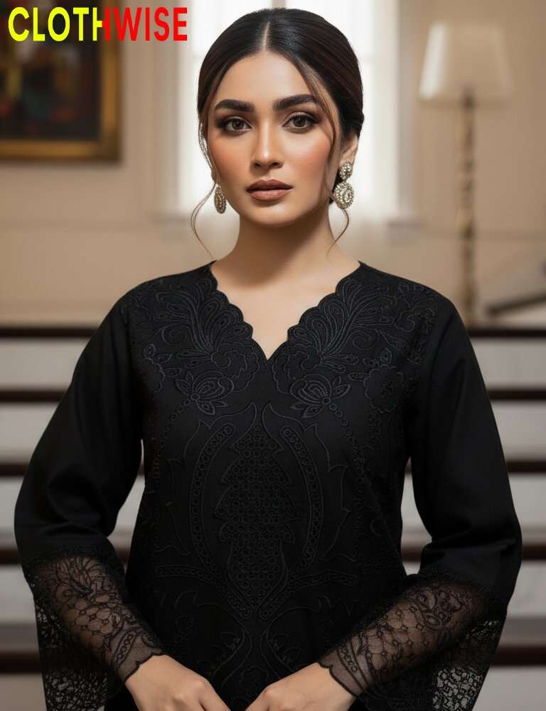 Woman wearing a black embroidered outfit with 'CLOTHWISE' branding.