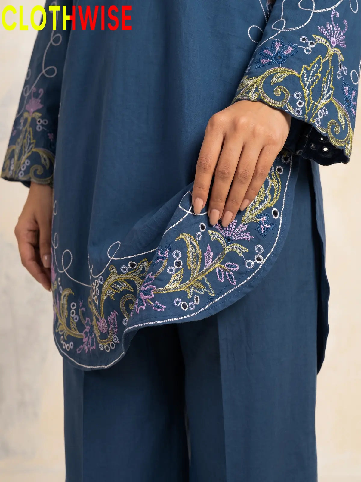 Haseen Blue embroidered lawn suit - daman embroidery close-up