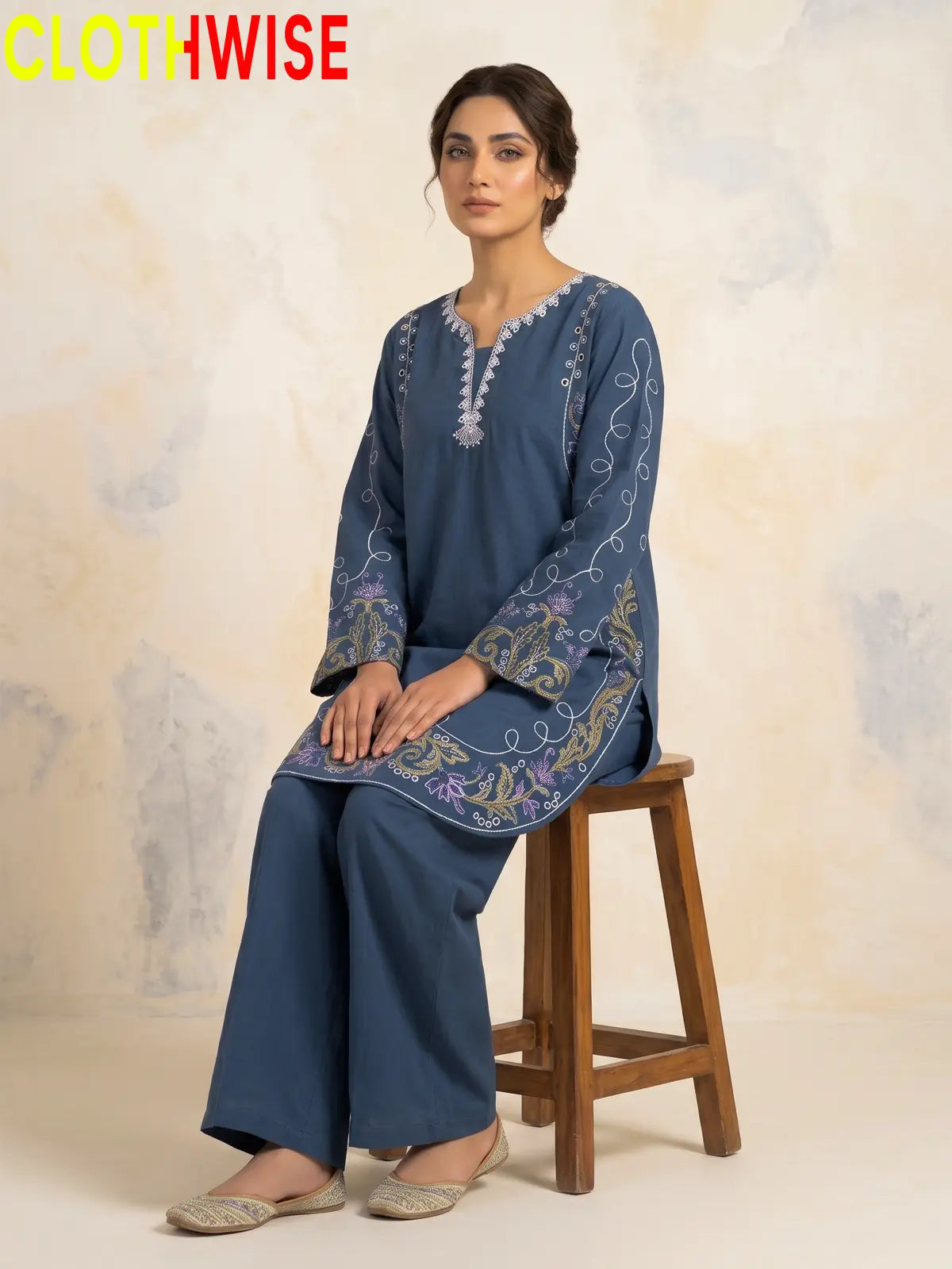 Haseen Blue embroidered lawn suit - sitting view
