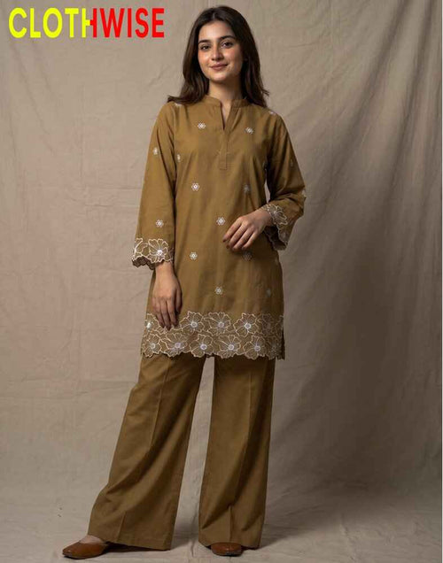 Woman wearing a brown traditional outfit with lace details on a beige background, branded 'Clothwise'.