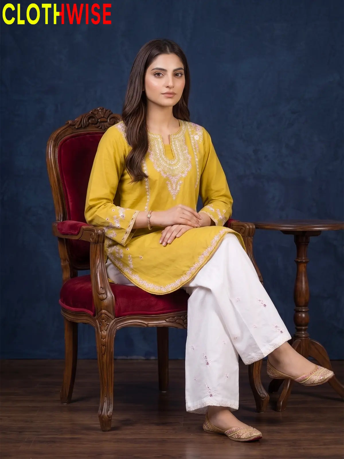 Zeenat Mustard 2-piece sequin embroidered suit - sitting pose