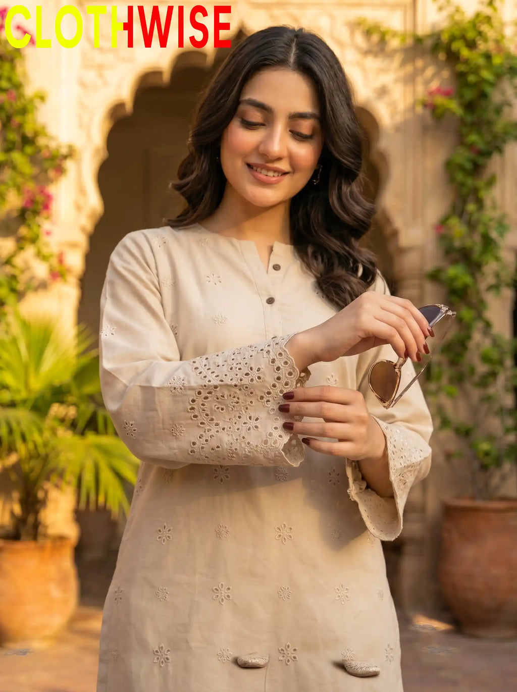Tabeer Skin suit close-up showing chikankari embroidery and cutwork daman detailing | Clothwise