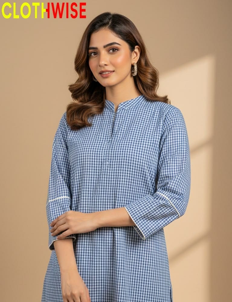 Woman wearing a blue checkered dress with 'CLOTHWISE' branding on a beige background