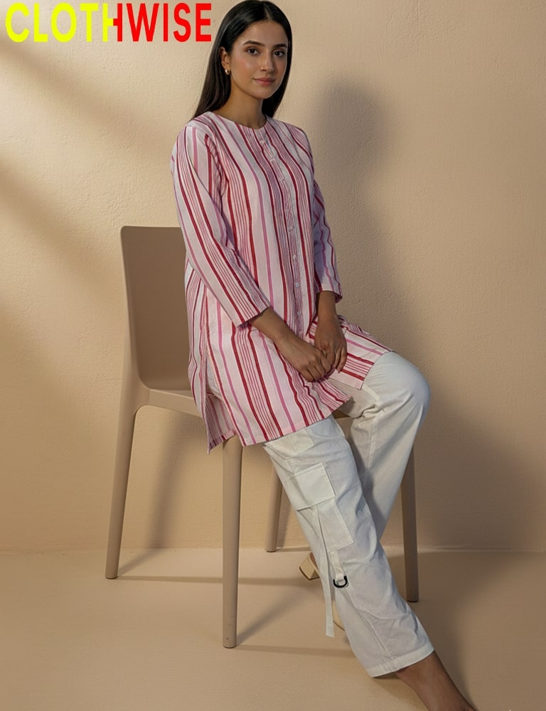 Woman sitting on a chair wearing a red and white striped shirt and light-colored pants, with 'CLOTHWISE' branding.