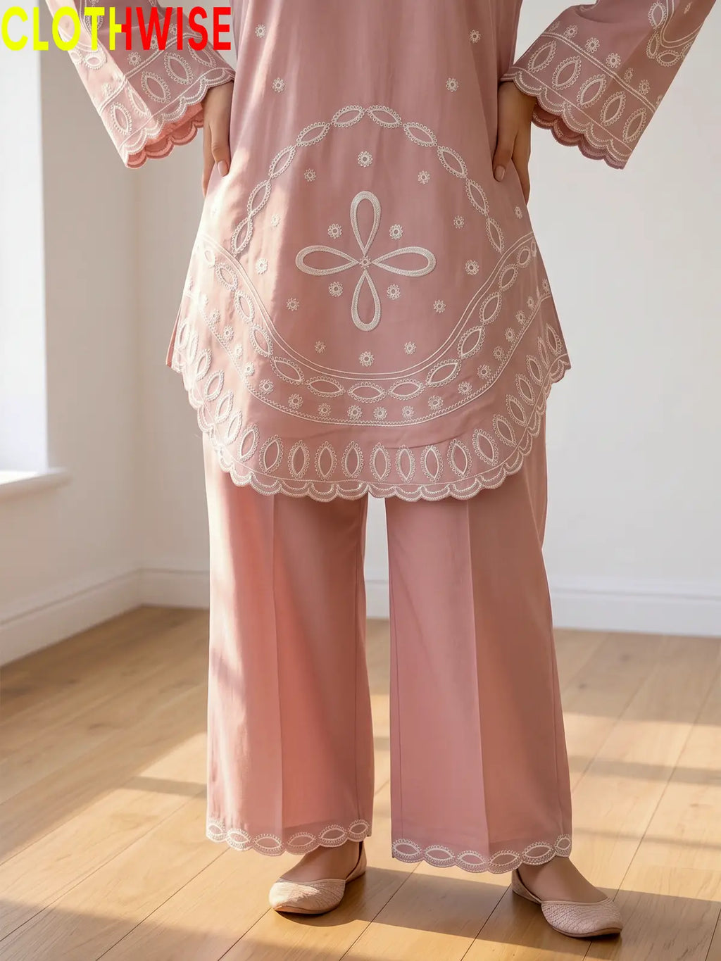 Aarzo embroidered lawn suit baby pink daman embroidery closeup