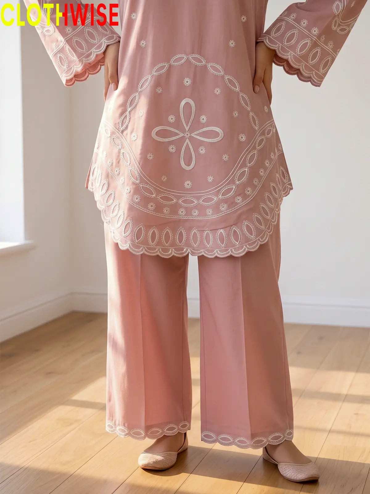 Aarzo embroidered lawn suit baby pink daman embroidery closeup