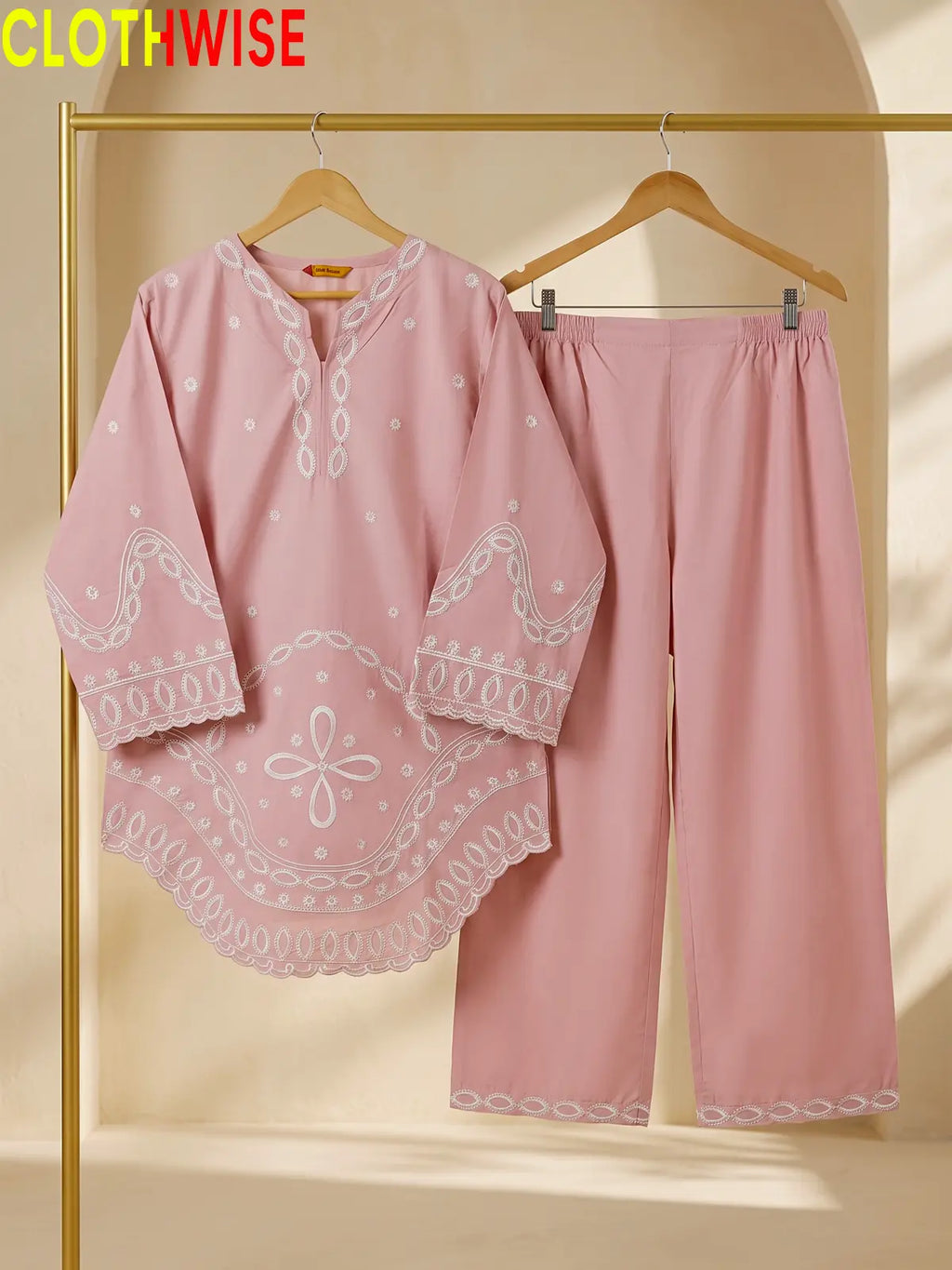 Aarzo embroidered lawn suit baby pink hanger view