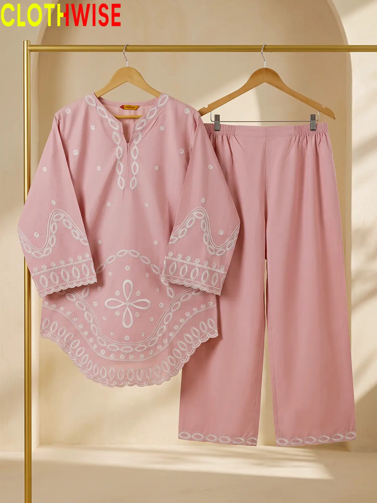 Aarzo embroidered lawn suit baby pink hanger view