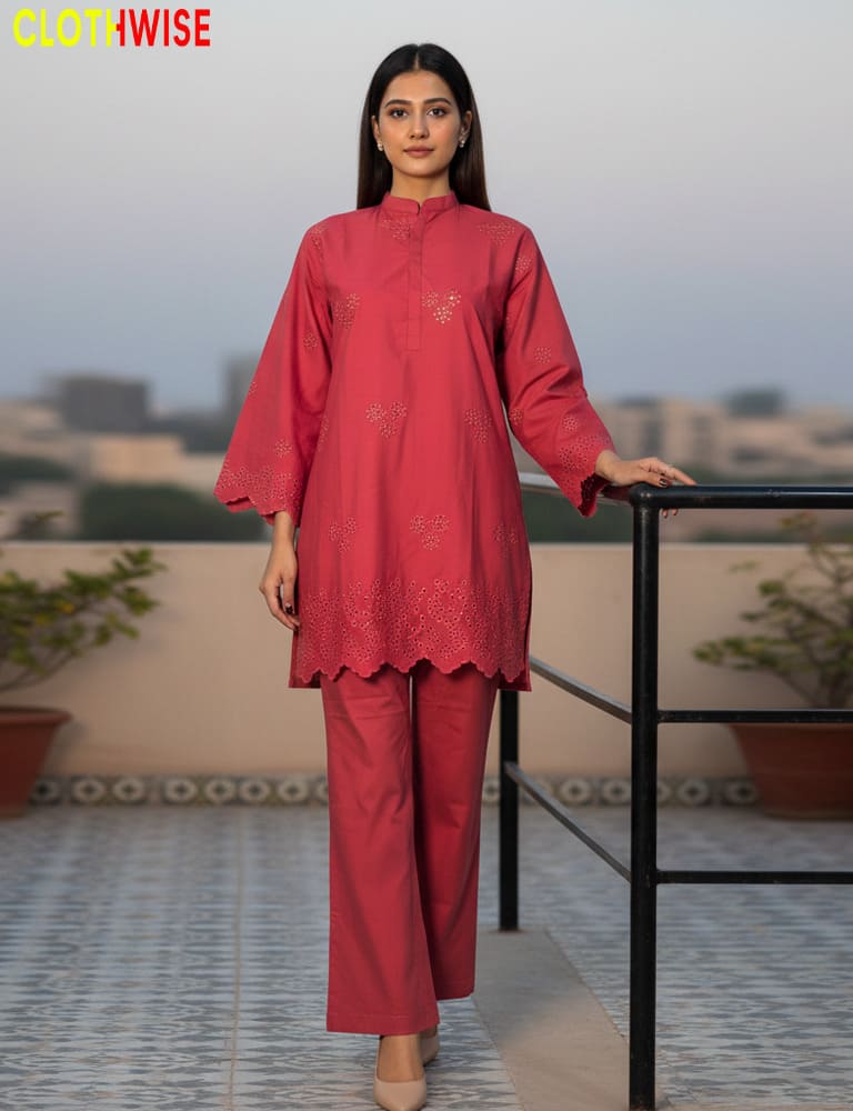 Woman wearing a red outfit on a rooftop with 'Clothwise' branding.