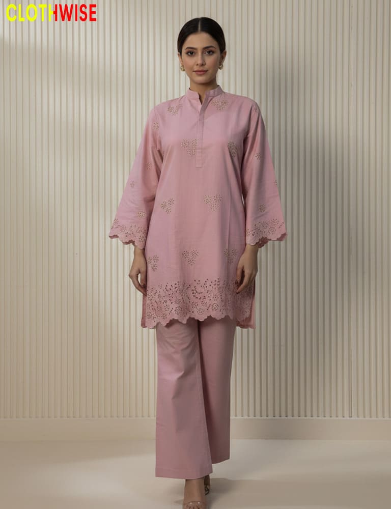 Woman wearing a pink outfit with lace details against a neutral background, branded 'Clothwise'.