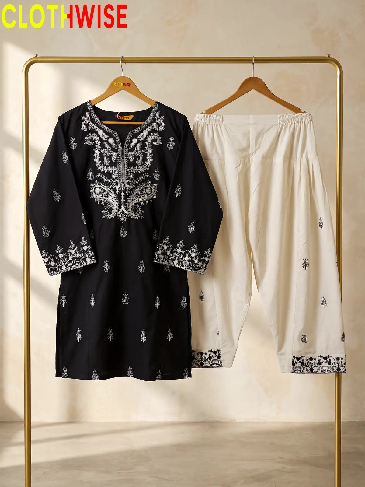 Mushq Black 2-piece embroidered cotton suit on hanger
