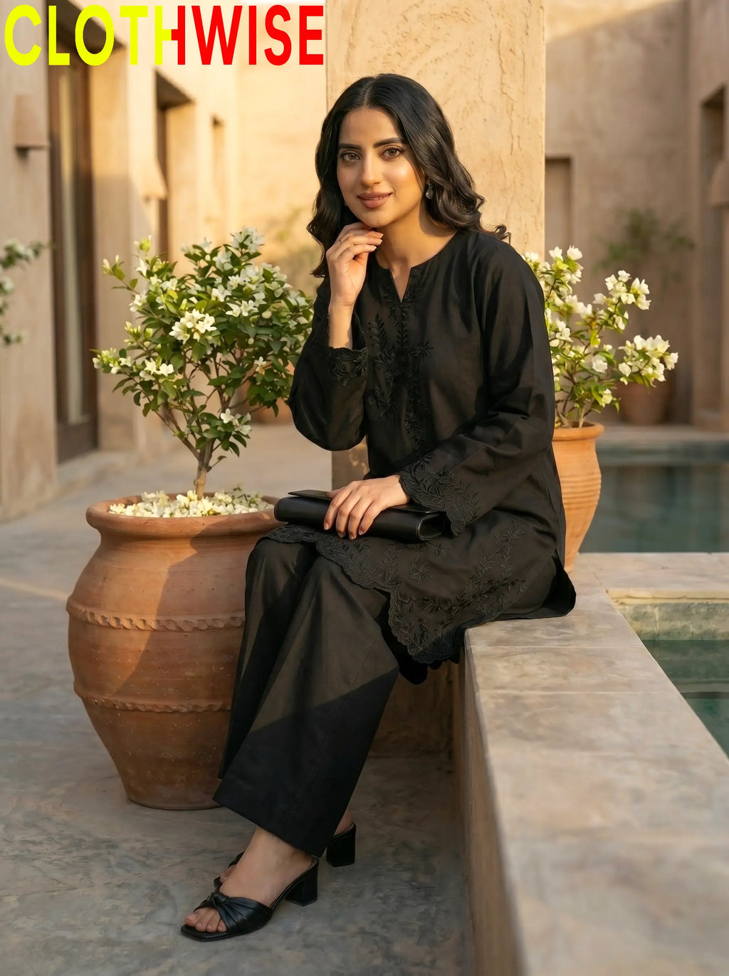 Gulkari Black Embroidered Suit with Flapper Bottom Sitting View – Clothwise