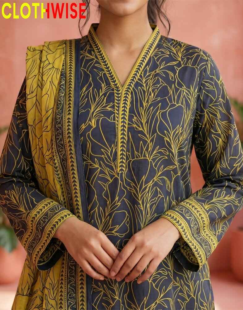 Woman wearing a blue and yellow patterned dress with 'CLOTHWISE' branding.