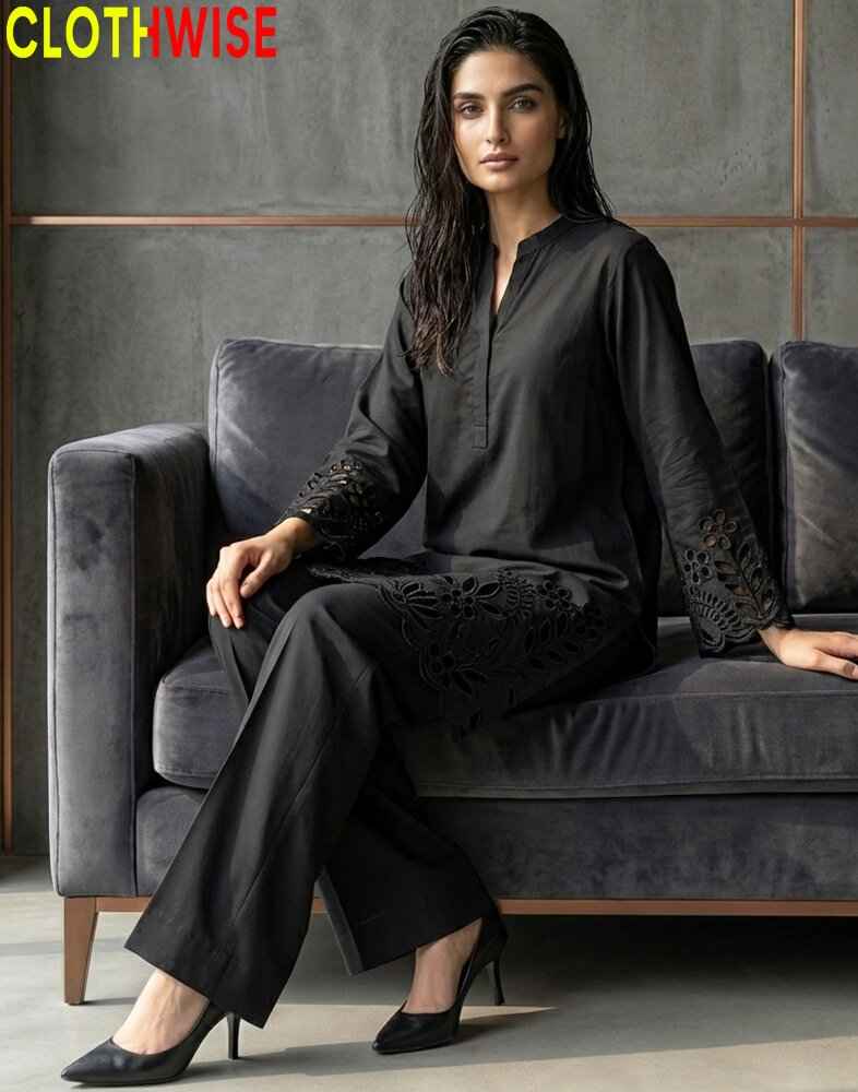 Woman in black outfit sitting on a gray sofa with 'CLOTHWISE' branding.