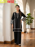women wear a black 2pice sit by clothwise