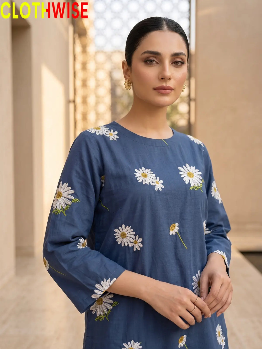 Daisy Blue embroidered cotton suit - close up embroidery detail - CLOTHWISE