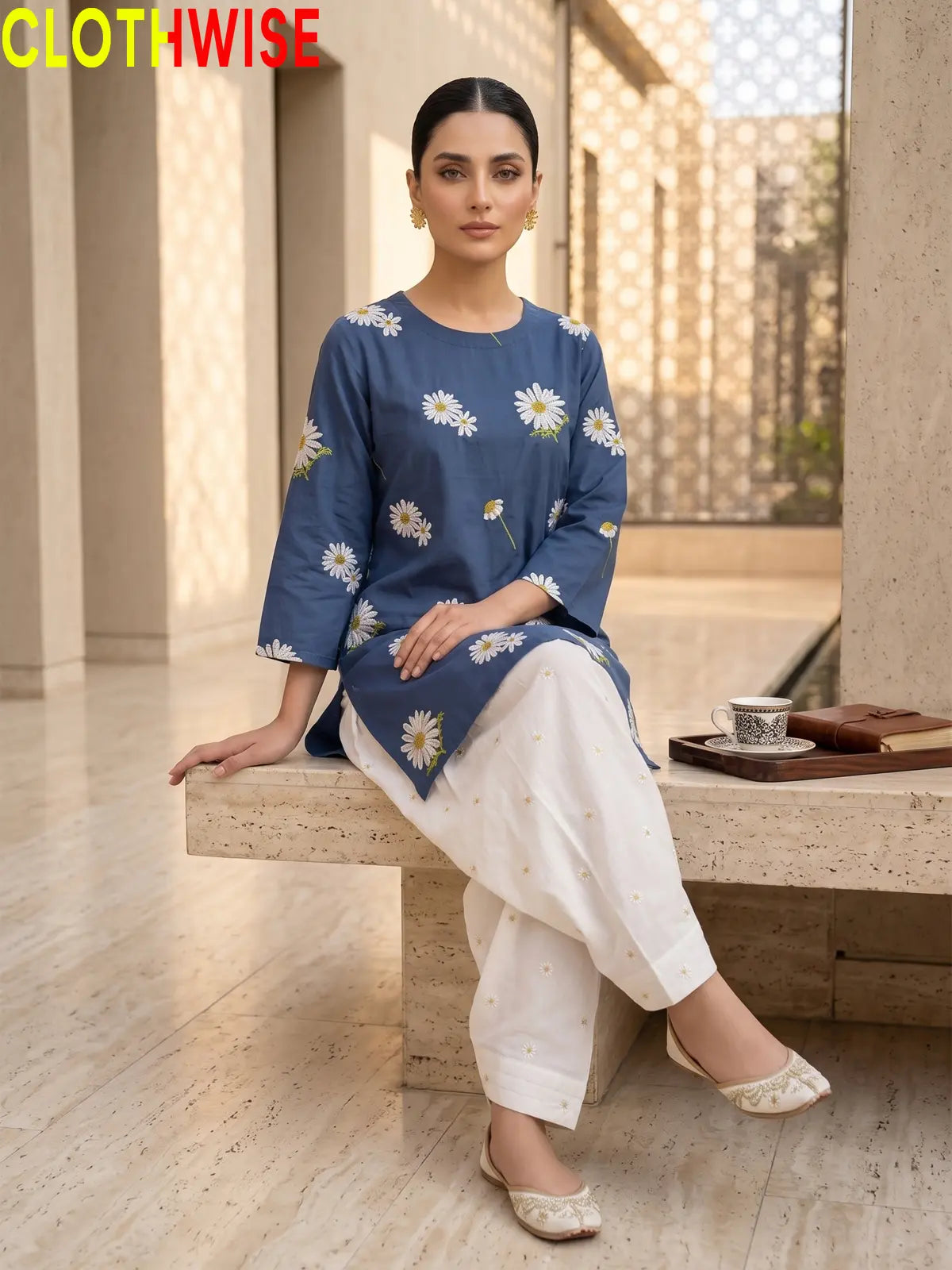Daisy Blue embroidered cotton suit - sitting view - CLOTHWISE