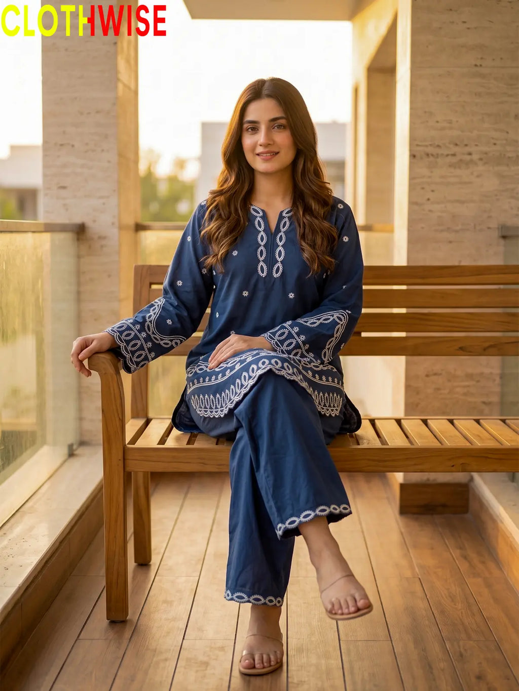 Aarzo embroidered lawn suit blue sitting view