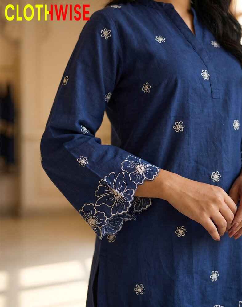 Blue embroidered kurta with floral patterns on sleeves and chest, brand 'CLOTHWISE' visible.