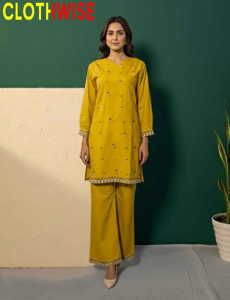 Woman wearing a mustard yellow traditional outfit with 'CLOTHWISE' branding against a green and beige background.