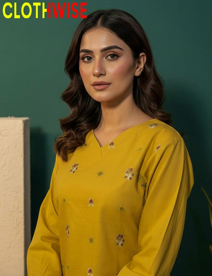 Woman wearing a yellow outfit with floral patterns against a green background, branded 'ClothWise'.