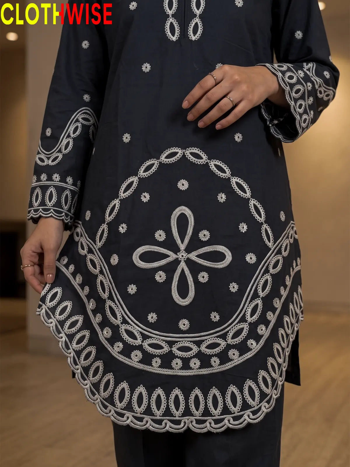 Aarzo embroidered lawn suit charcoal daman embroidery closeup