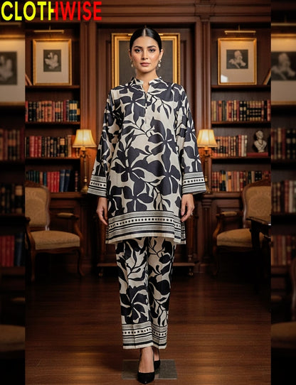 Woman in a black and white patterned outfit standing in a library setting with 'CLOTHWISE' branding.