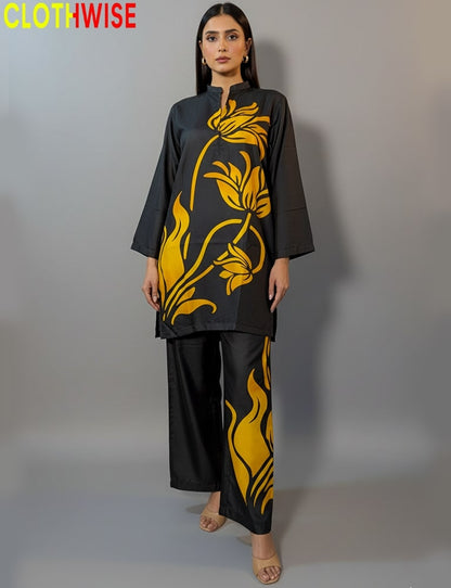 Woman wearing a black outfit with yellow floral patterns on a gray background, branded 'Clothwise'.