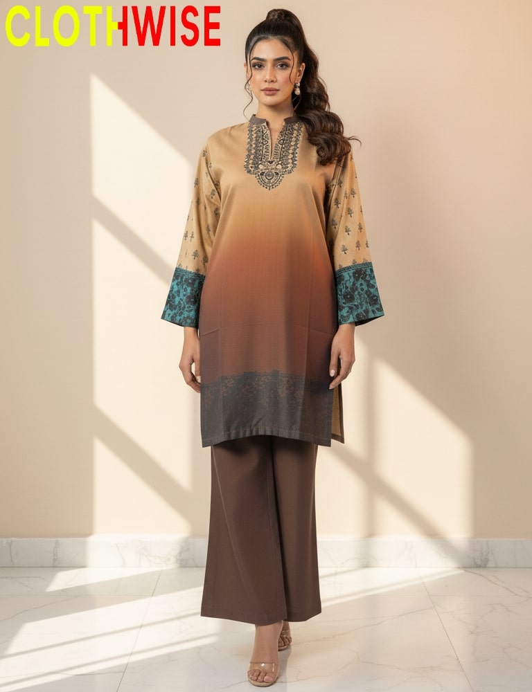 Woman wearing a brown and beige outfit with intricate designs, standing against a light-colored wall.