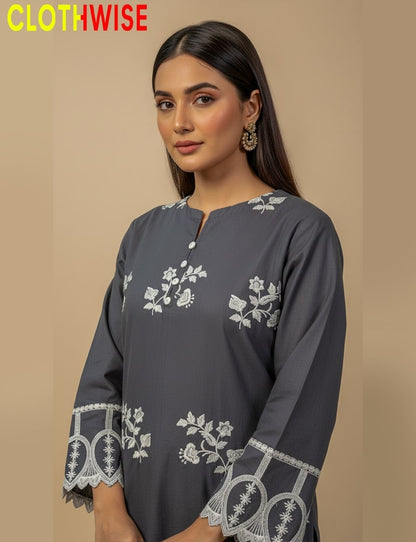 Woman wearing a dark gray kurta with white embroidery on a beige background, branded 'Clothwise'.