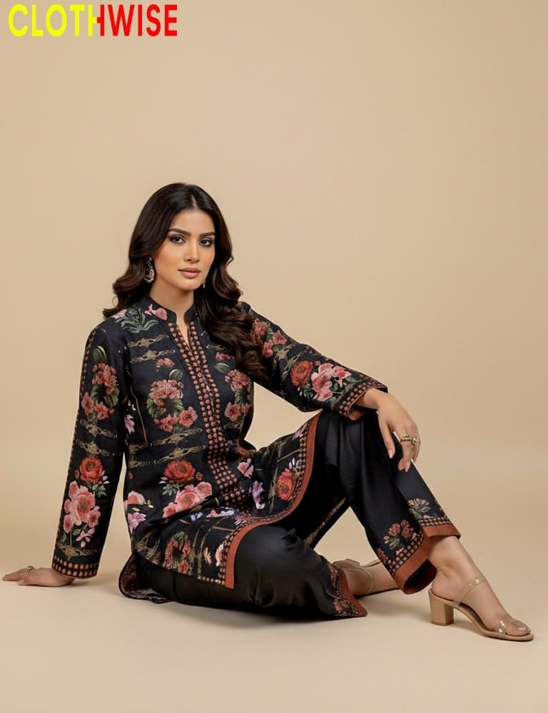 Woman wearing a floral digital printed outfit with 'CLOTHWISE' branding.