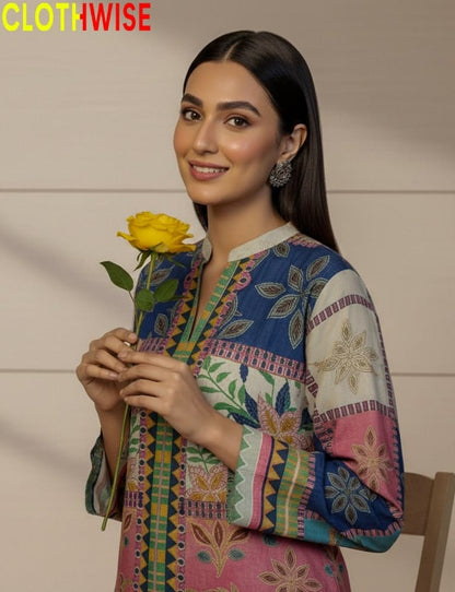 Woman holding a yellow rose wearing a colorful embroidered dress with 'CLOTHWISE' branding.
