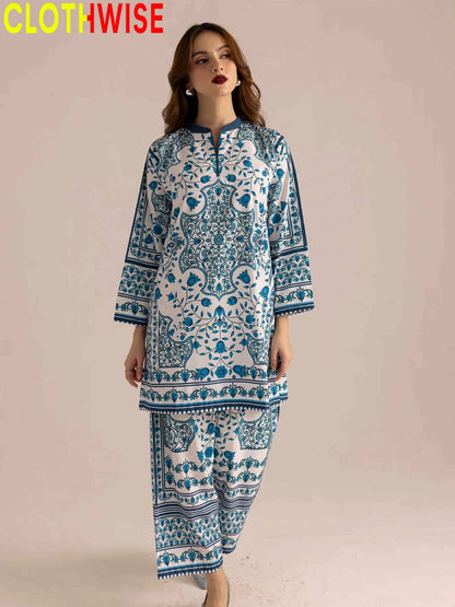 Woman wearing a blue and white patterned outfit with 'CLOTHWISE' branding.