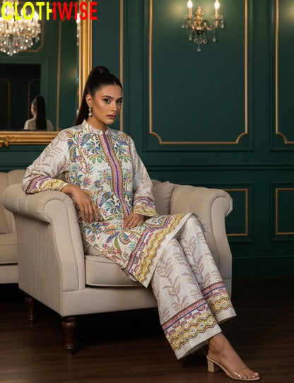 Woman in a patterned outfit sitting on a chair in an elegant room with 'CLOTHWISE' branding.