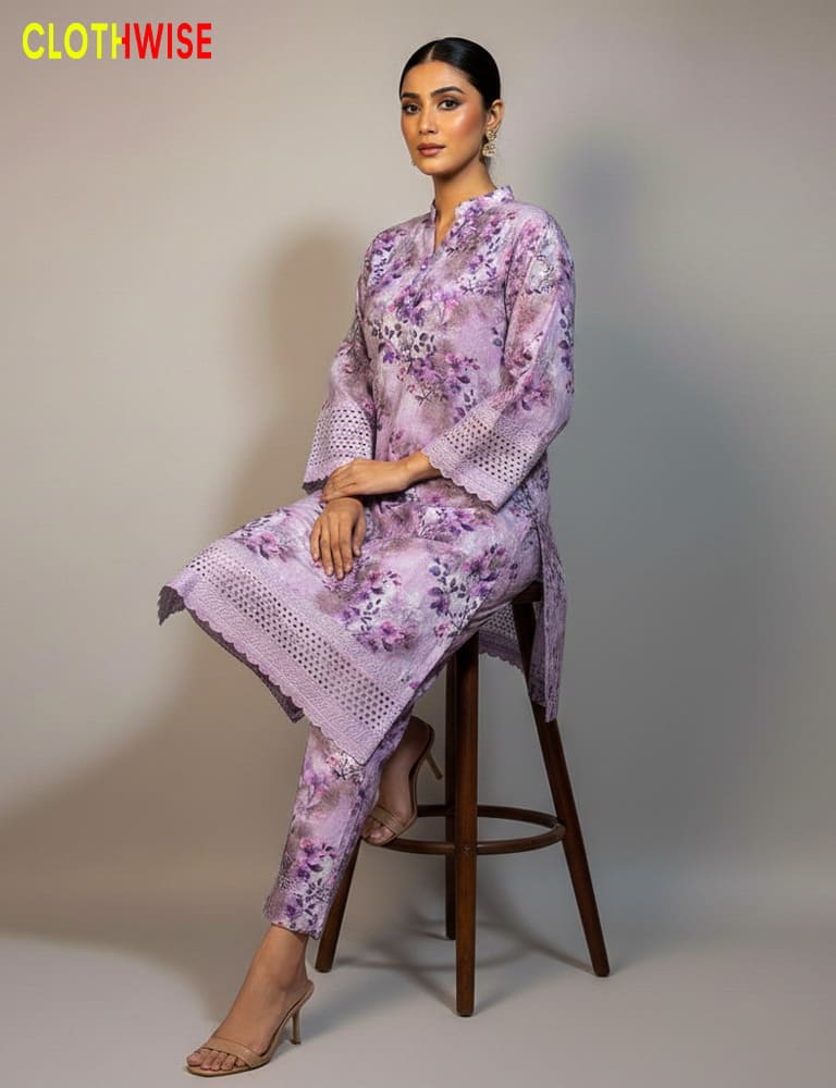 Woman wearing a floral dress sitting on a stool with 'Clothwise' branding.