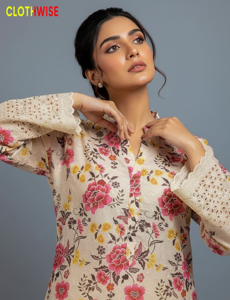 Woman wearing a floral dress with lace sleeves, branded 'Clothwise'.