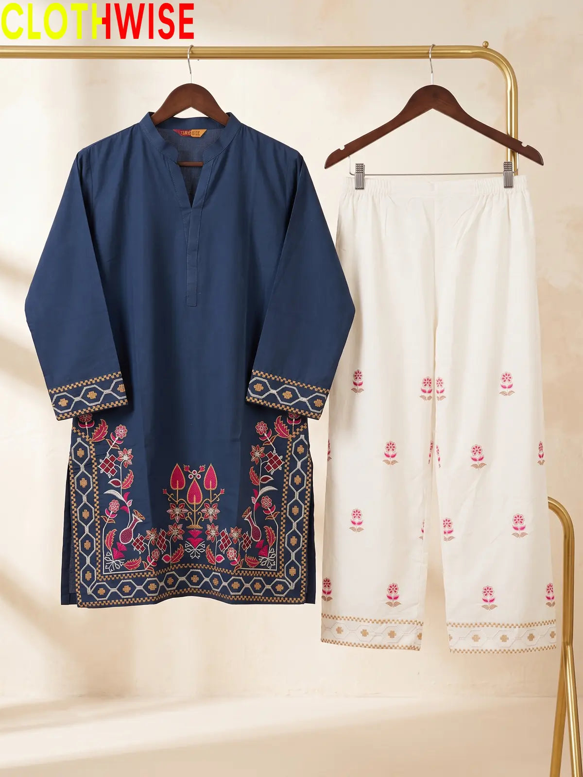 Shajar Deep Blue embroidered 2-piece cotton suit on hanger