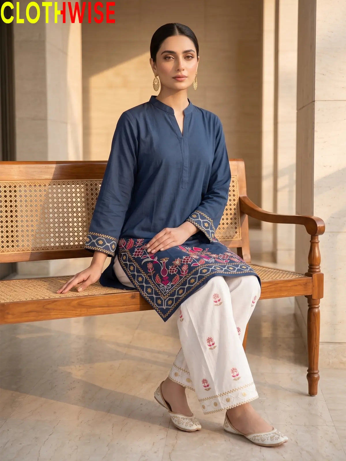 Shajar Deep Blue embroidered cotton suit sitting pose
