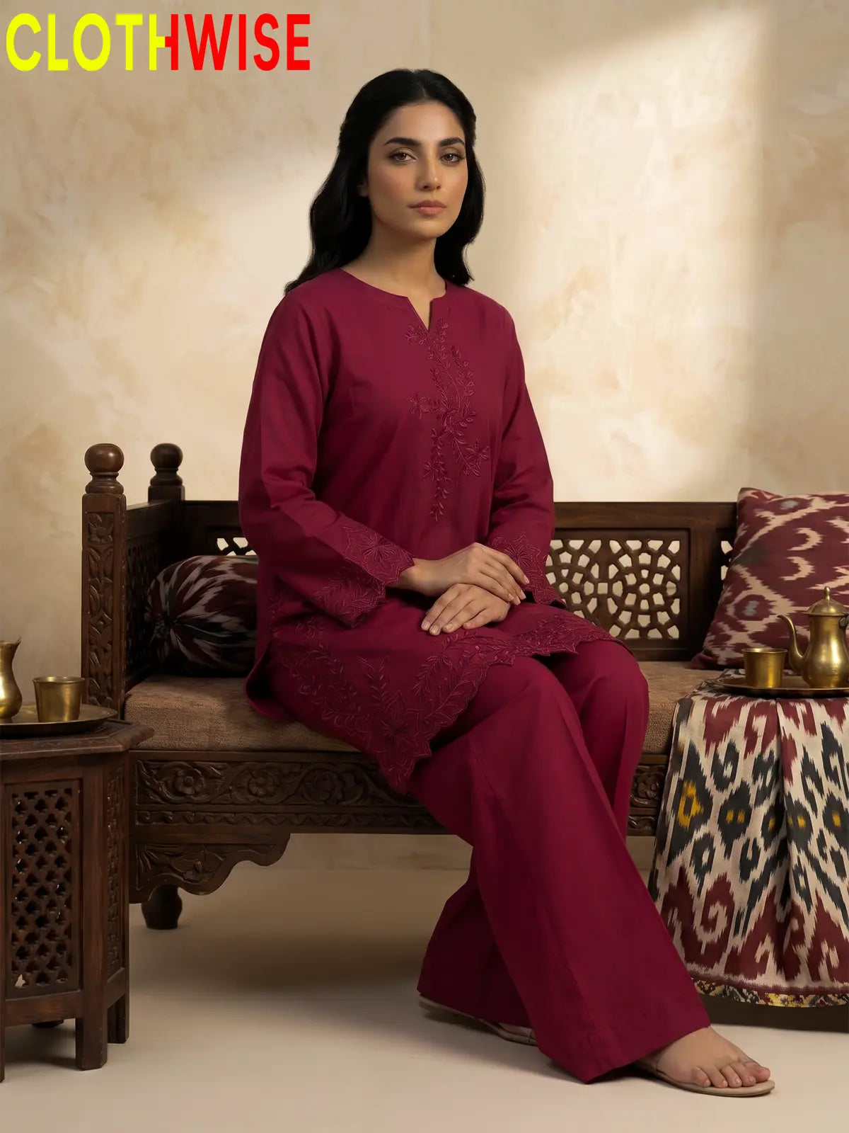 Gulkari chikankari embroidered cotton co-ord set in Deep Raspberry - sitting view