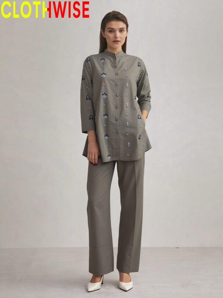 Woman wearing a gray outfit with floral patterns on a plain background, branded 'CLOTHWISE'.